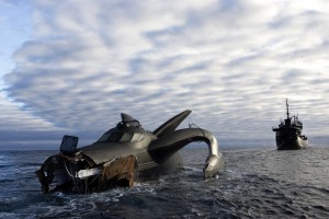 The Ady Gil towed by the Bob Barker.